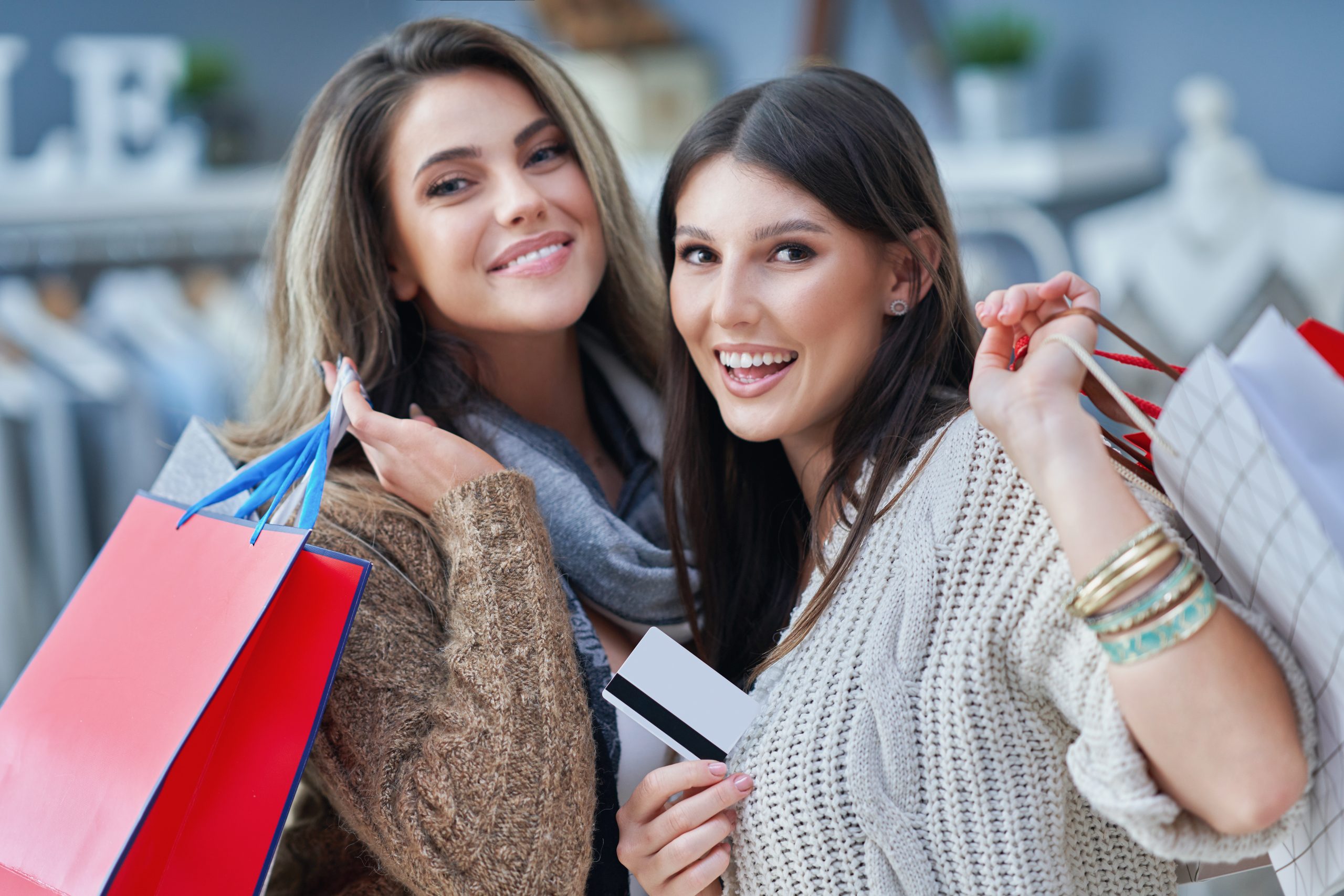 Group of happy friends during shopping. High quality photo